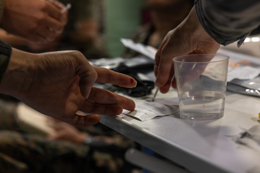 Journalists reviewing printed evidence and documents at a table